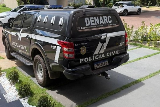 Policial Civil durante a Operação Convergência, deflagrada na região metropolitana de Cuiabá